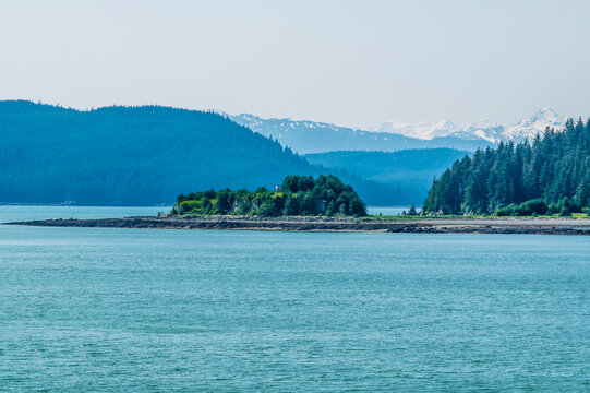 A view across an islet in the Gastineau Channel on the approach to Juneau, Alaska in summertime