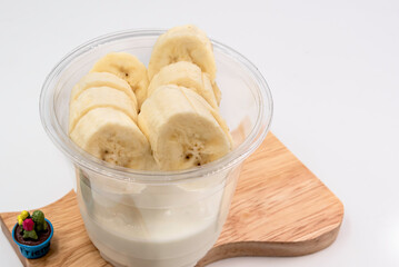 Bowl of fresh yogurt with fruit served for good health.