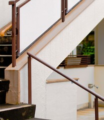 Indoor marble staircase with stainless steel handrail