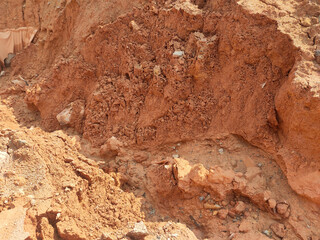 Obraz premium Erosion on the ground and slopes is caused by rainwater. The soil structure becomes weak and there is a landslide. Safety measure has been taken in some area.