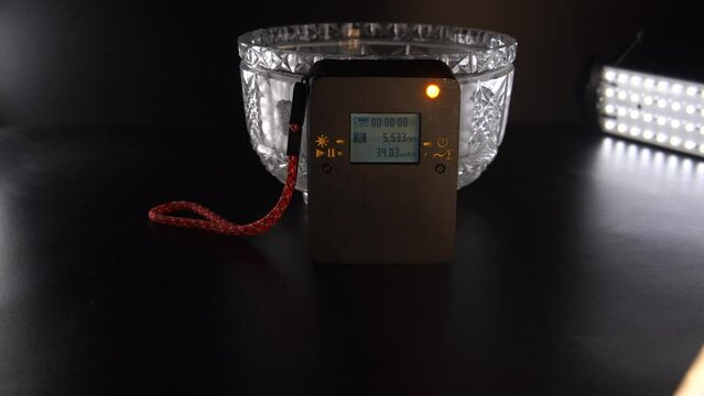 Homemade household dosimeter of radiation ionizing. Overdose in the old Soviet crystal, vase, salad bowl, sugar bowl. Concept of dangerous objects at home.