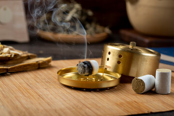Background of moxibustion and Chinese herbal medicine