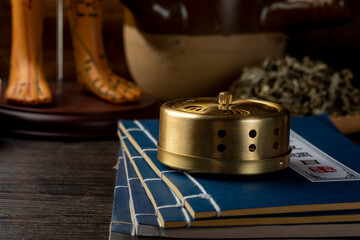 Background of moxibustion and Chinese herbal medicine