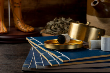 Naklejka premium Background of moxibustion and Chinese herbal medicine