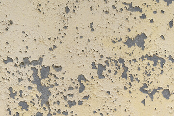 Grungy rough textured wall. Peeled abstract background