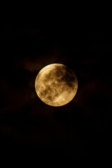 Full moon in a dark sky