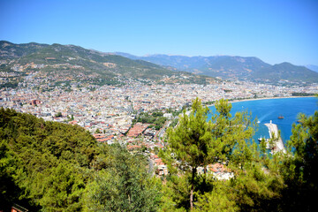 Fototapeta na wymiar alanya town with mediterranean sea and mountains, top view