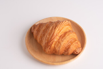 plain crossants. fresh baked on plate on table