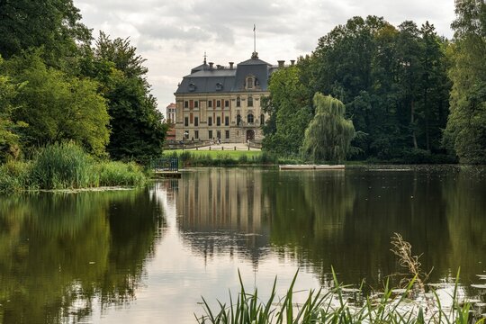 Reflection of Pszczyna castle or Pless castle on the lake