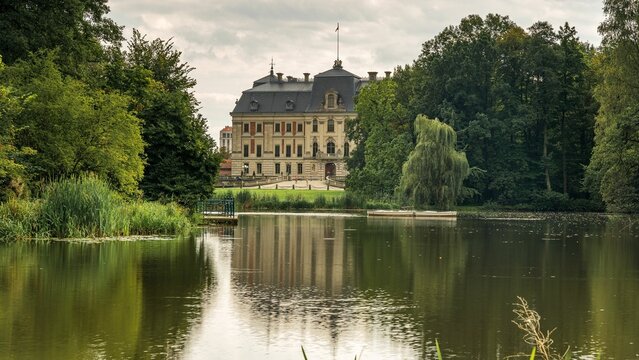 Reflection of Pszczyna castle or Pless castle on the lake