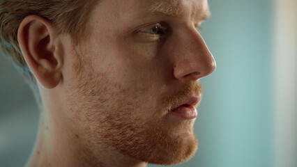 Handsome guy looking screen closeup. Focused manager analyzing problem in office