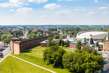 above view of wall and Tower of Kolomna Kremlin and Uspenskiy Brusenskiy Monastery in Old Kolomna city on summer day from bell tower Church of St John the Evangelist
