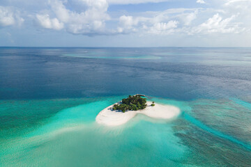 Aerial view in Maldives atoll island.  Tropical aerial landscapes of Maldives paradise lagoon beaches.