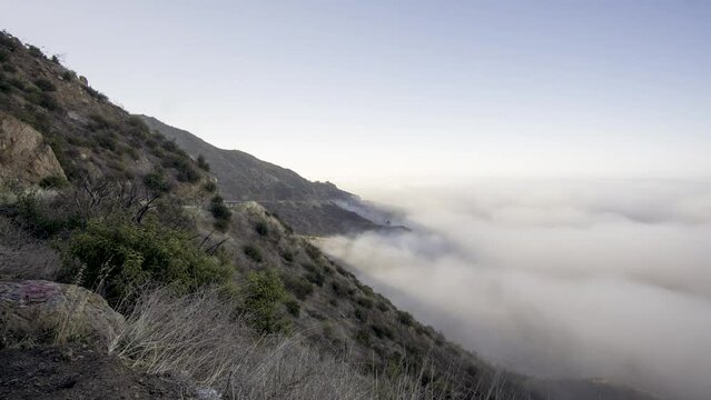 Timelapse of the fog rolling up a mountain in California