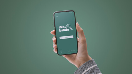 Woman using a real estate app on her smartphone