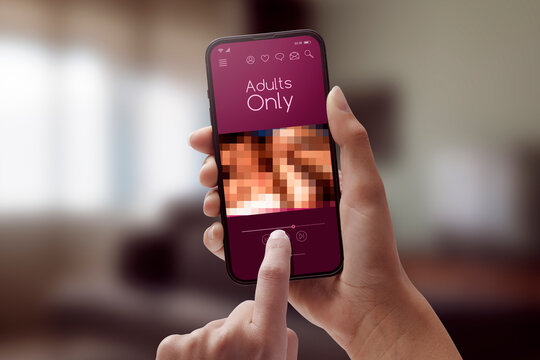 Woman Watching Porn Videos On Her Smartphone