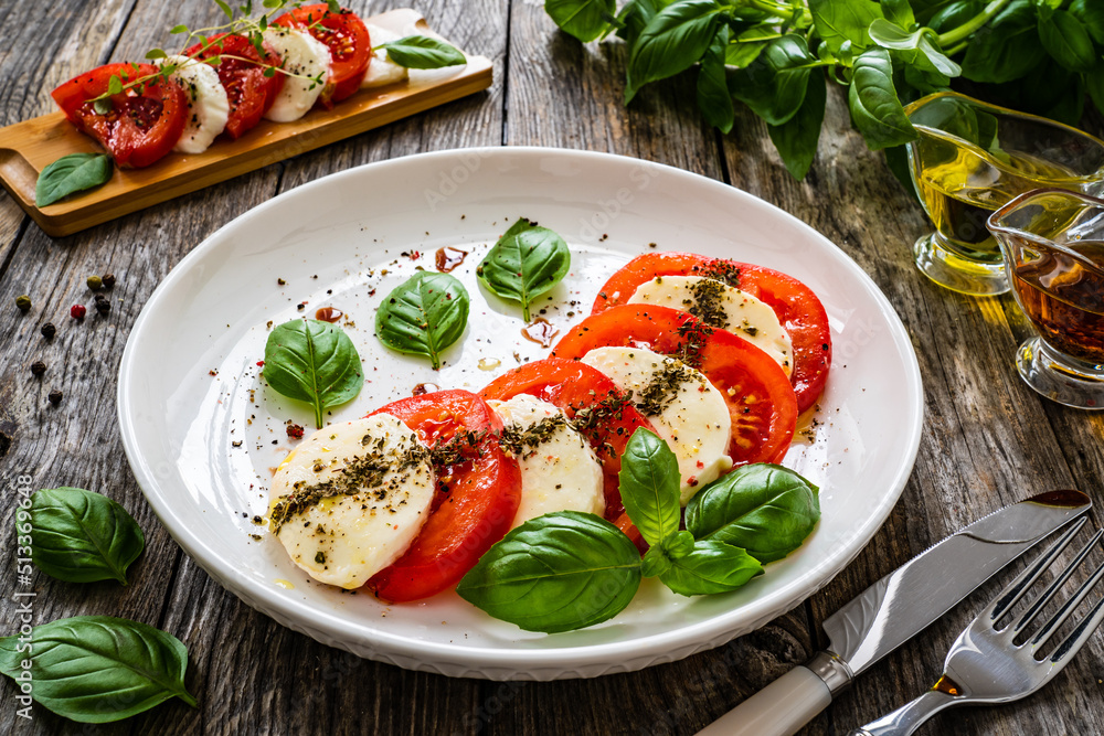 Sticker caprese salad on wooden table - Stickers