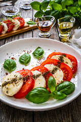 Caprese salad on wooden board
