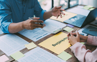 Business team meeting present.professional investor working with new startup project. Teamwork process, business people working in the office discussing documents and ideas at meeting.