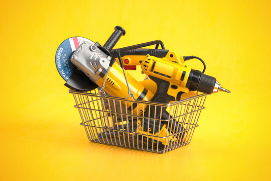 Shopping basket with elecric tools and construction equipment angle grinder, electric drill and jigsaw on yellow. Selling and buying online.