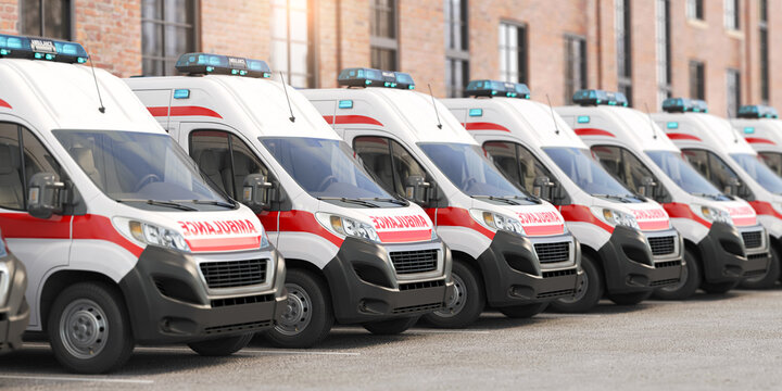 Ambulance cars in a row on a parking of hospital.