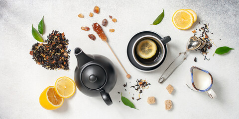 Tea composition on light grey background. Flat lay. Top view. Banner