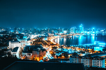 Naklejka na ściany i meble Panorama of the night Baku. View from a height. Republic of Azerbaijan