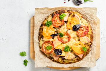 Tomato cheese ham zucchini pizza. Top view, flat lay, copy space.