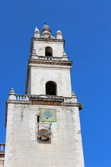 Tower of the Cathedral of San Ildefonso on the main square Plaza Grande in Merida, Yucatan peninsula, Mexico. It is first cathedral finished on the American mainland - obrazy, fototapety, plakaty