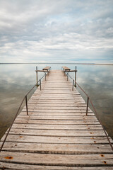 Old wooden dock on lake