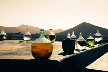 bottles in sunny valley of lanzarote