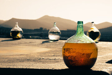 bottles in sunny valley of lanzarote