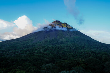 Fototapeta na wymiar Beautiful aerial view of the Arenal Volcano, the arenal Lagoon, and rain forest in Costa Rica