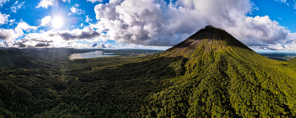 Beautiful aerial view of the Arenal Volcano, the arenal Lagoon, and rain forest in Costa Rica