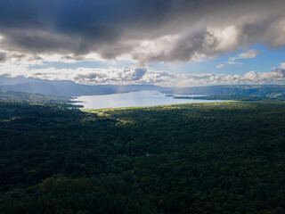 Obraz premium Beautiful aerial view of the Arenal Volcano, the arenal Lagoon, and rain forest in Costa Rica