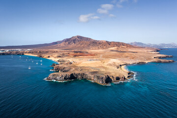 aerial view of lanzarote island with steep coast and mountains