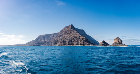 view on lanzarote coast and mountain from a ship