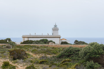 Fototapeta na wymiar Lighthouse at Cap Blanc in Mallorca, Spain