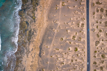 aerial view of sea beach and road  with cars