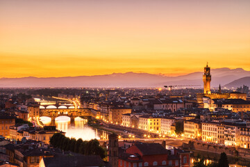 Florence Aerial View at Golden Sunset over Ponte Vecchio Bridge, Palazzo Vecchio and Cathedral of Santa Maria del Fiore with Duomo