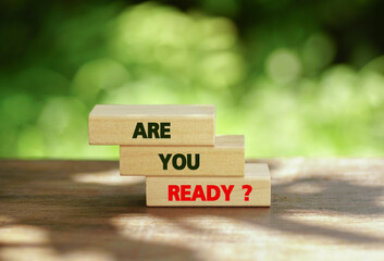 ARE YOU READY - words on wooden blocks on the natural background,                      