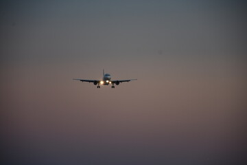 Fototapeta na wymiar Aircraft approaching Corfu International Airport. Corfu island, Greece