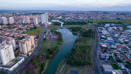 Indaiatuba Ecological Park. Beautiful park in the city center, with lake and beautiful trees and houses. Aerial view