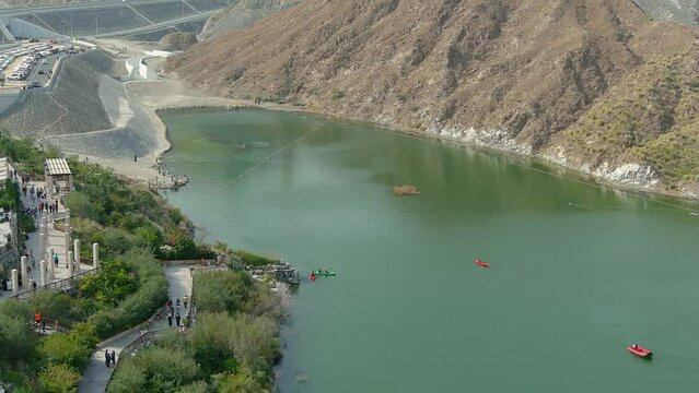 Tourist's small boats in the al rafisah dam, 2022
Drone view from rafisah dam in United Arab Emirates, 2022 
