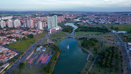 Indaiatuba Ecological Park. Beautiful park in the city center, with lake and beautiful trees and houses. Aerial view
