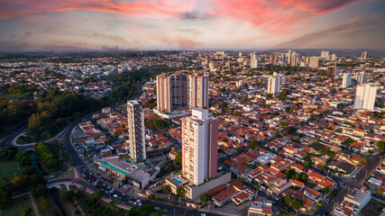 Indaiatuba Ecological Park. Beautiful park in the city center, with trees and houses. Aerial view