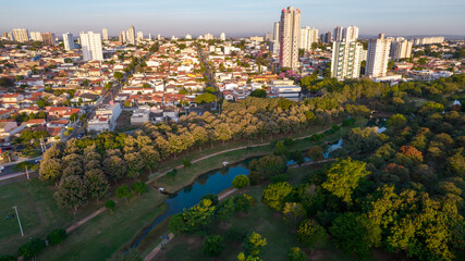 Indaiatuba Ecological Park. Beautiful park in the city center, with trees and houses. Aerial view