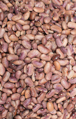 Frijoles color rosa claro apilados en forma de textura desde una toma cenital 