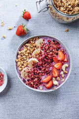 Fruity healthy muesli bowl on table