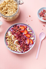 Fruity healthy muesli bowl on table